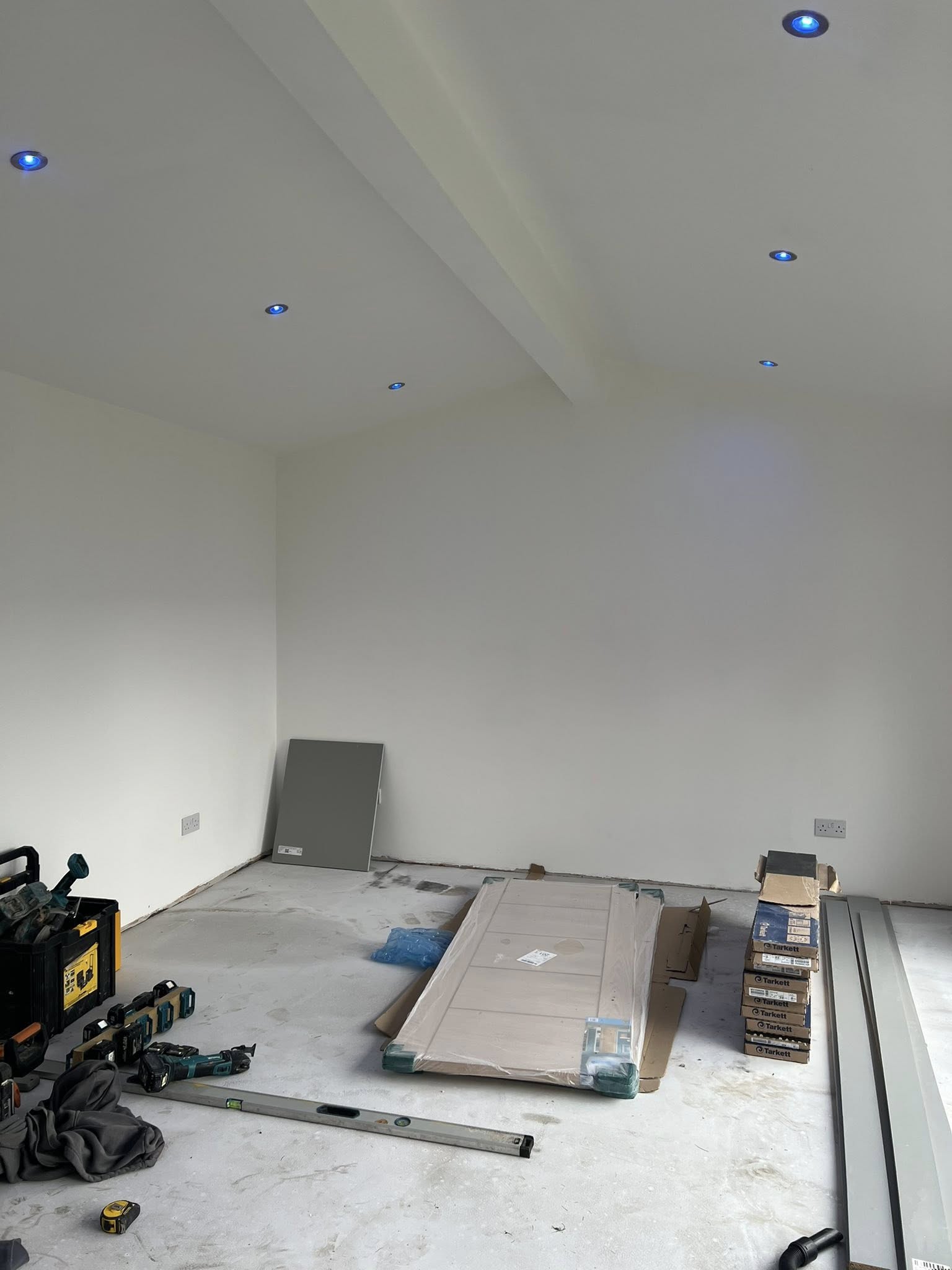 Room refurbishment in progress with tools and materials on site